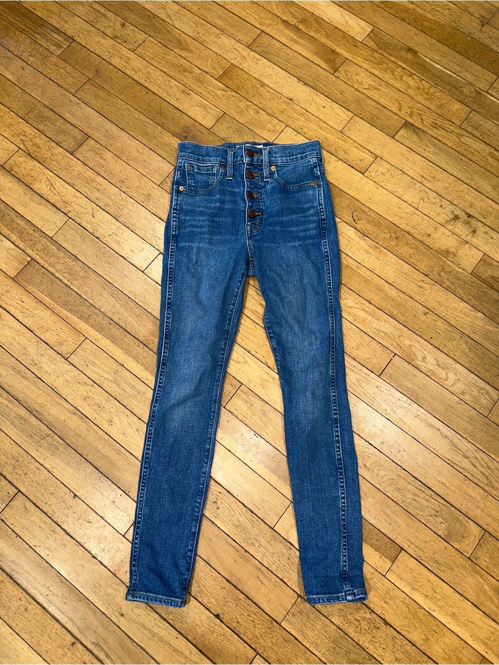 Woman’s Madewell high-rise skinny jeans denim bottoms
